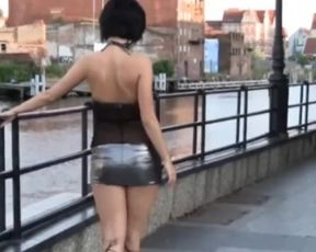 Sexy Brunette MILF in too Short Latex Minidress Exposes Upskirt in Streets!