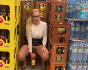 Sexy German bitch pisses on produce inside Supermarket