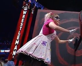 WWE - Alexa Bliss turning a crank at Wrestlemania 37