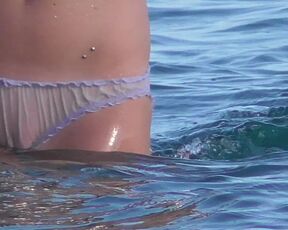 Beach girl goes for swimming in panties - watch out