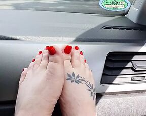 feet in the car