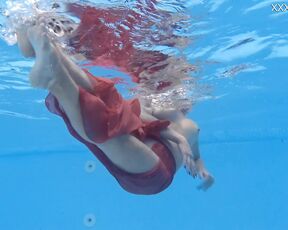 Hottest milf strips underwater