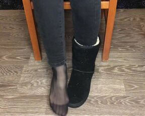 Student girl show nylon socks, boots and foot after study