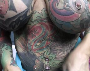 Heavily Tattooed And Pierced Biker Chick Black Widow Sucks