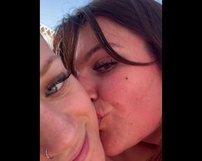 Close up POV of real lesbian couple kissing